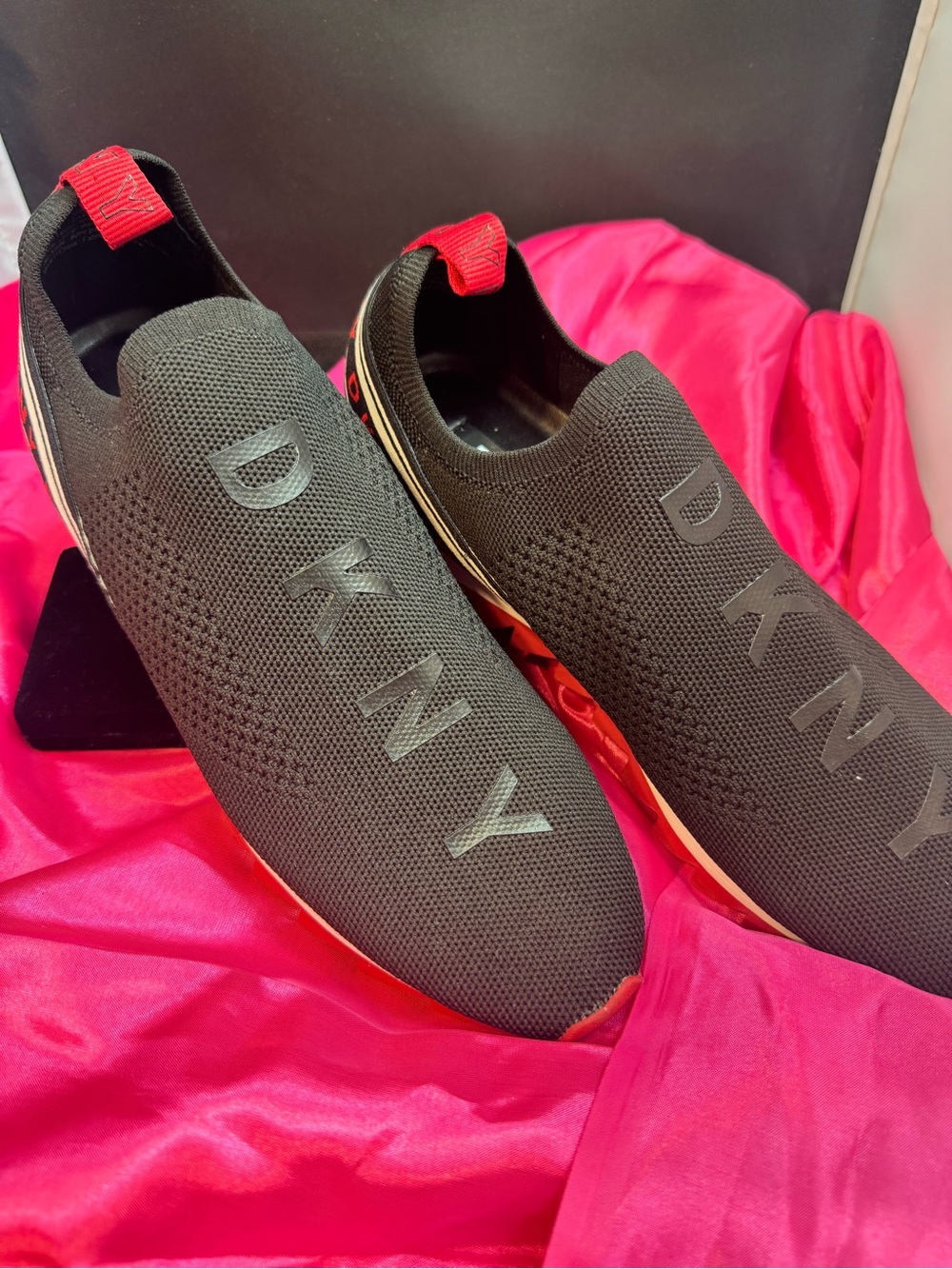 DKNY Black Knit Slip-On Sneakers with Red Heel Tab